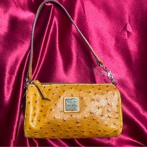 Dooney Ostrich barrel bag